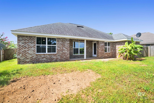 16529 Cold Mill Loop, Foley, AL 36535 - rear view of house with brick siding, roof with shingles, and a patio area