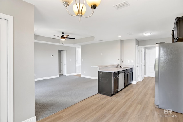 16529 Cold Mill Loop, Foley, AL 36535 - kitchen with stainless steel appliances, light countertops, ceiling fan, light wood-style flooring, and recessed lighting