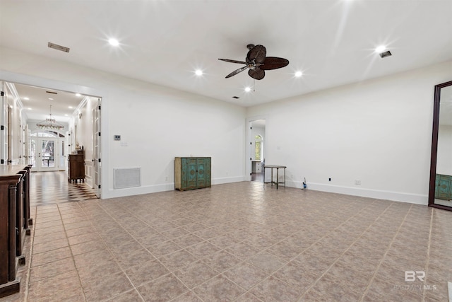 spare room with french doors, plenty of natural light, and ceiling fan