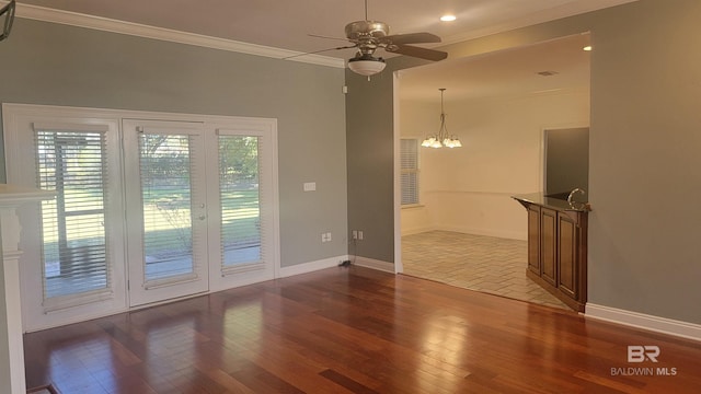 306 S Tee Dr, Fairhope, AL 36532 - unfurnished room featuring ceiling fan, hardwood / wood-style floors, crown molding, a chandelier, and recessed lighting