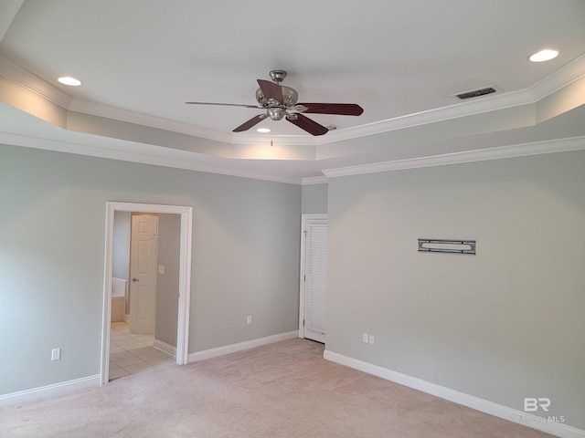 306 S Tee Dr, Fairhope, AL 36532 - spare room featuring a raised ceiling, light colored carpet, a ceiling fan, ornamental molding, and recessed lighting