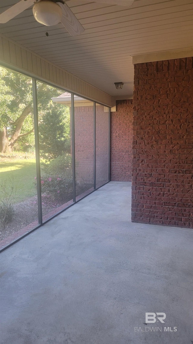 306 S Tee Dr, Fairhope, AL 36532 - unfurnished sunroom with a ceiling fan