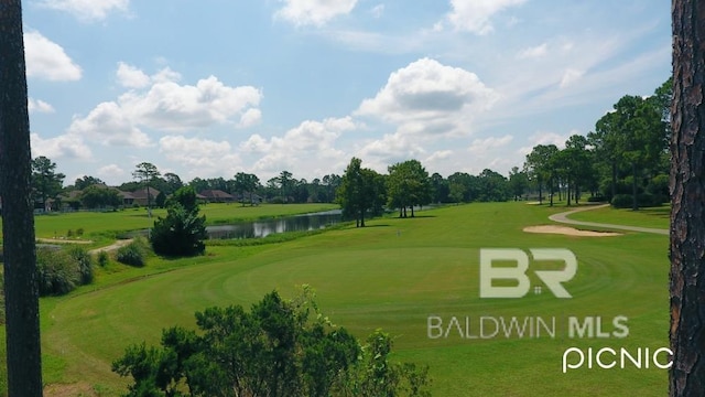 306 S Tee Dr, Fairhope, AL 36532 - view of property's community with a water view, golf course view, a yard, and view of scattered trees