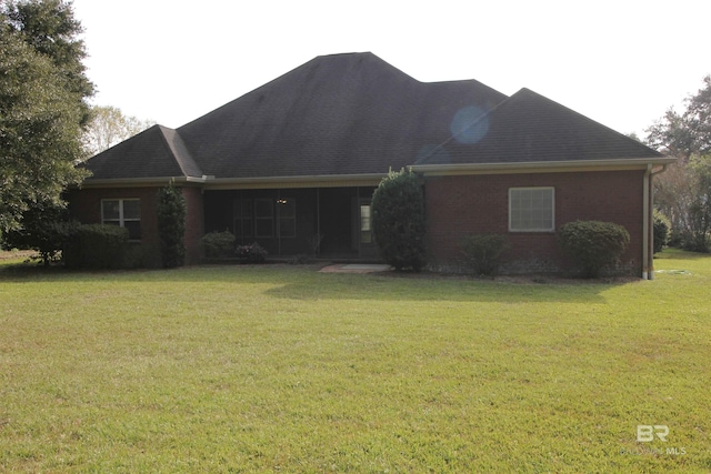 306 S Tee Dr, Fairhope, AL 36532 - view of front of home with a front yard and brick siding