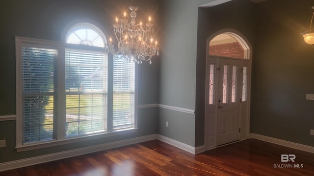 306 S Tee Dr, Fairhope, AL 36532 - entryway featuring wood finished floors, a chandelier, and plenty of natural light