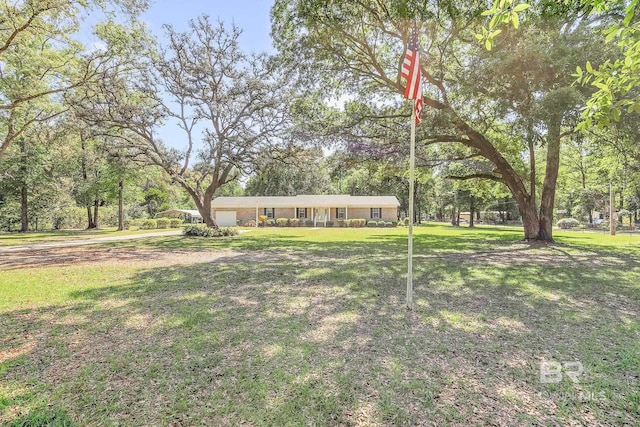 view of yard featuring an attached garage