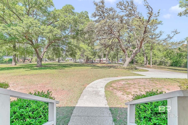 surrounding community with a yard