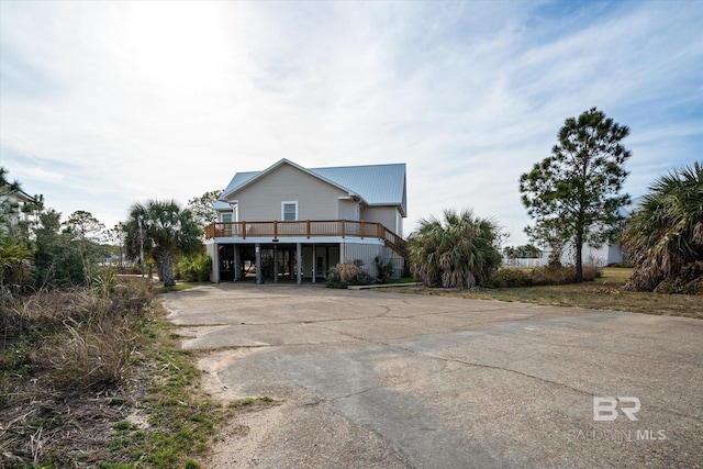 view of front of home featuring a carport