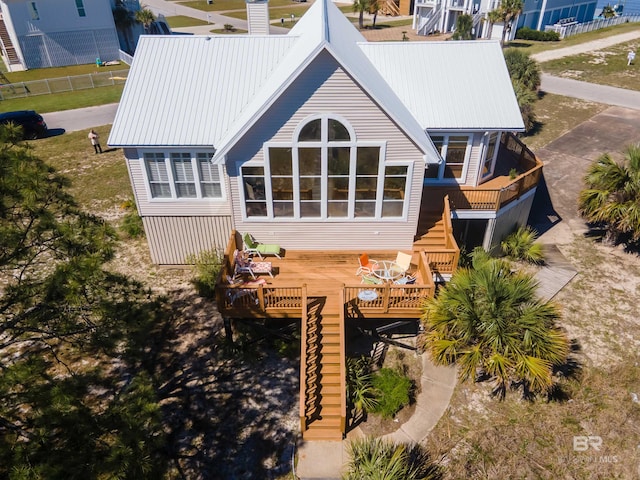 rear view of house with a deck