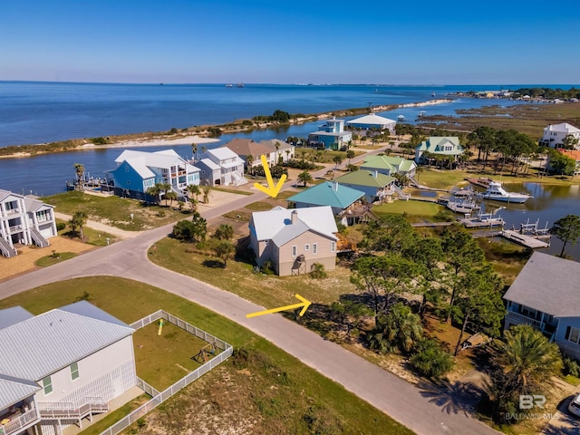 bird's eye view with a water view