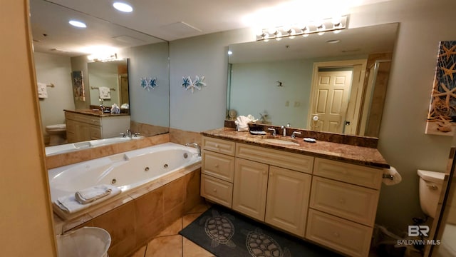 full bathroom featuring tile patterned flooring, shower with separate bathtub, vanity, and toilet