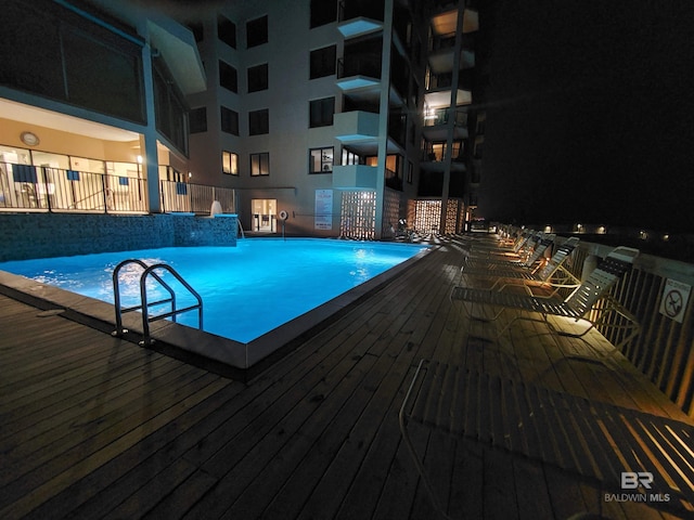 view of swimming pool featuring pool water feature