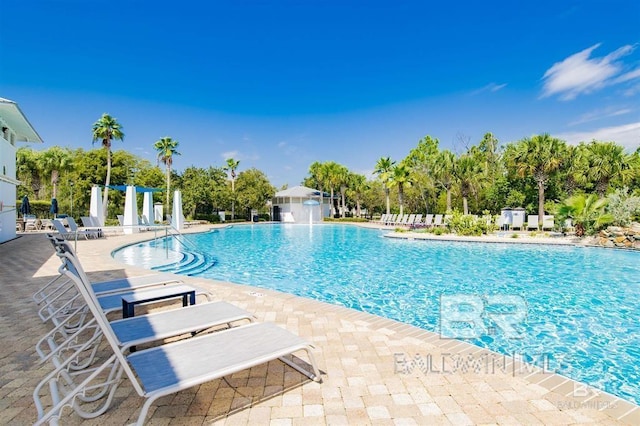 pool with a patio