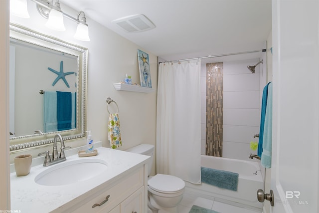 bathroom featuring vanity, toilet, shower / bath combo, and visible vents