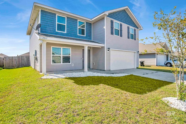 front facade featuring a garage and a front lawn