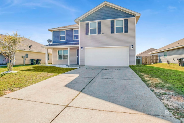 front of property with a front lawn and a garage