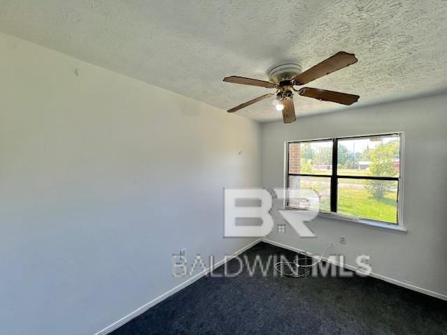 208 Lee St, Atmore, AL 36502 - carpeted empty room with ceiling fan, baseboards, and a textured ceiling
