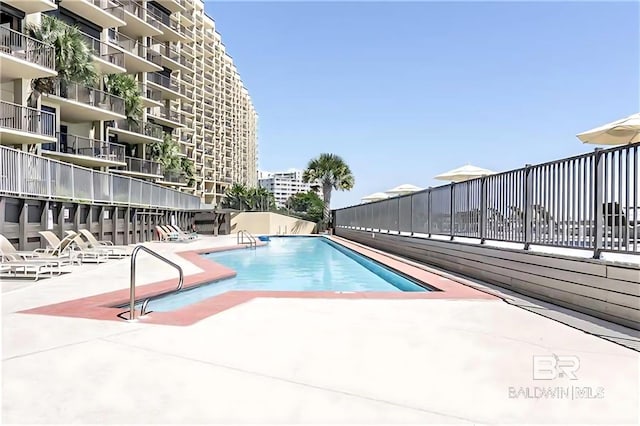 pool featuring a patio