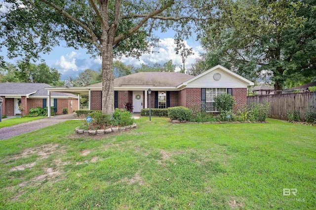 single story home featuring a front yard and a carport