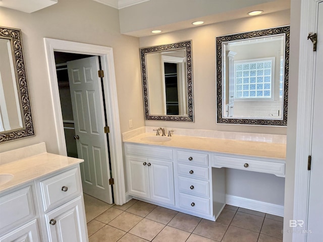 full bathroom with vanity and tile patterned floors