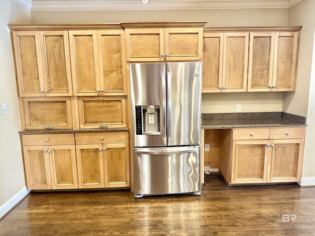 kitchen with dark wood-style floors, crown molding, and stainless steel fridge with ice dispenser