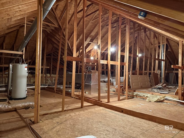 unfinished attic featuring water heater