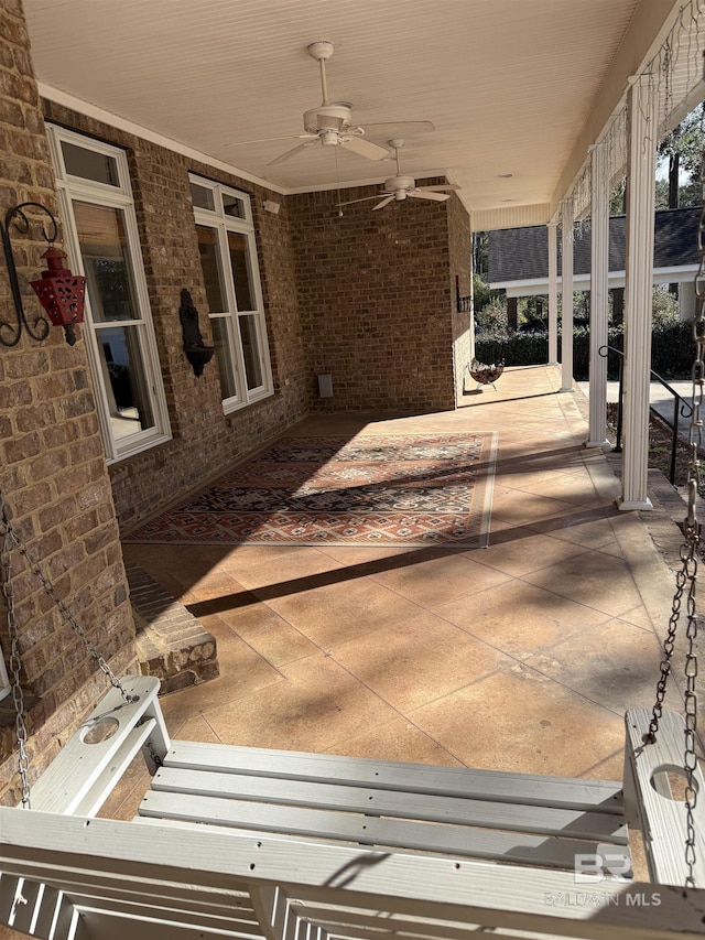 view of patio featuring a ceiling fan