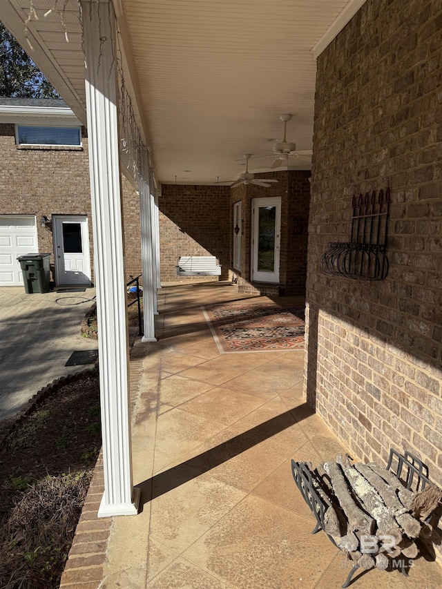 view of patio featuring a ceiling fan