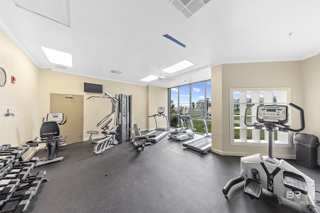 exercise room with ornamental molding