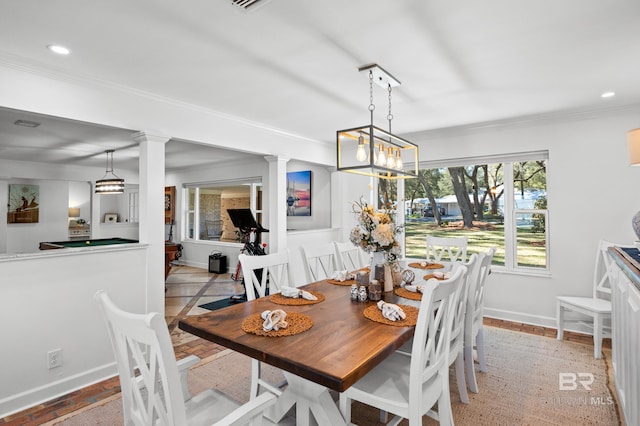 dining space featuring recessed lighting, decorative columns, and baseboards