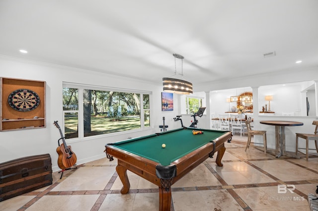 rec room with decorative columns, baseboards, crown molding, and recessed lighting