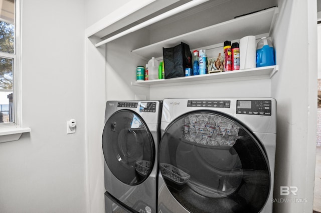 washroom with washer and clothes dryer