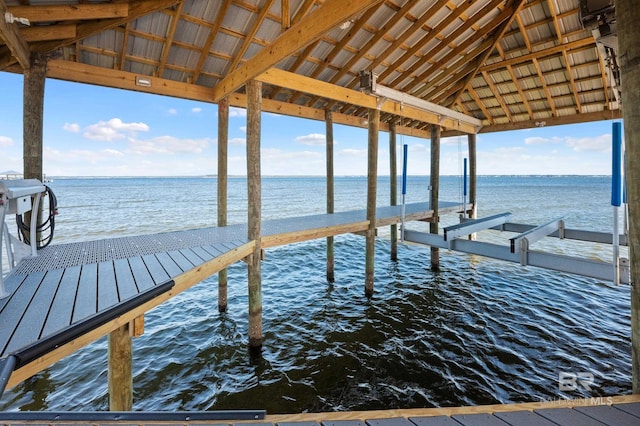 view of dock with a water view and boat lift