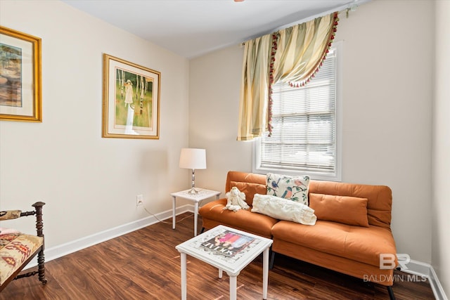 living room with dark wood-style floors and baseboards