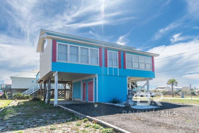 exterior space featuring a carport