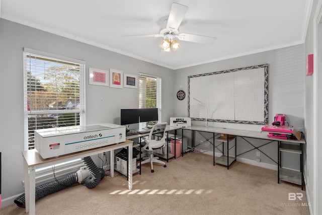 office featuring crown molding, light colored carpet, and ceiling fan