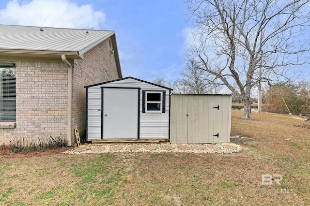 view of outdoor structure with a yard