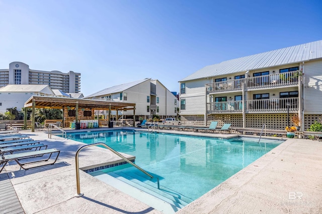 view of pool featuring a patio