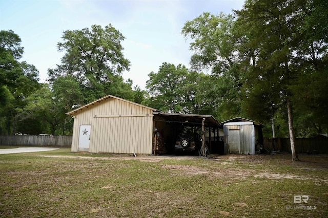 view of shed with fence