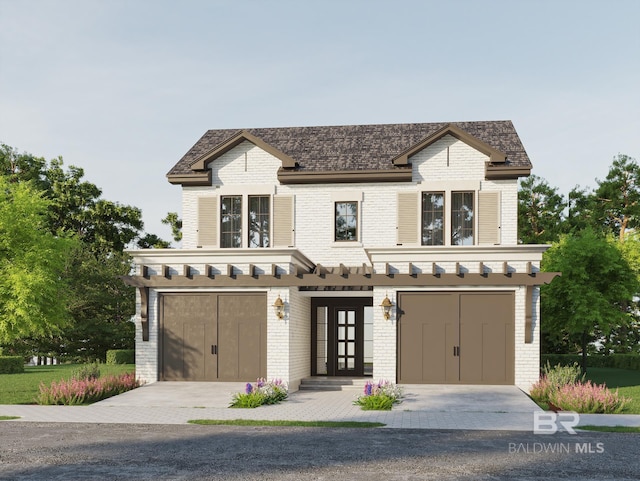 view of front facade with french doors and a garage