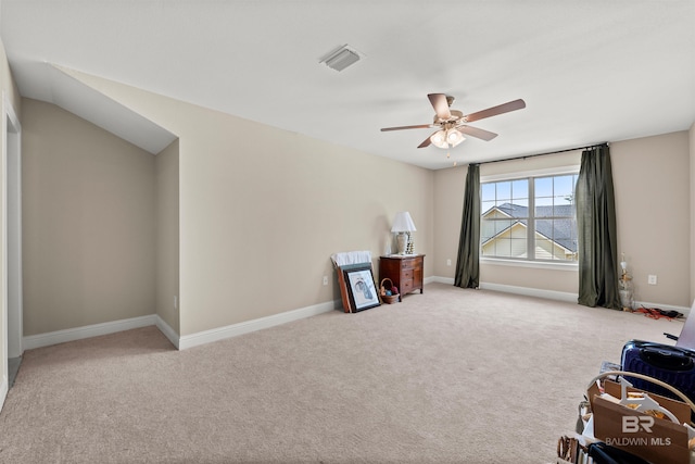 misc room featuring a ceiling fan, carpet, visible vents, and baseboards