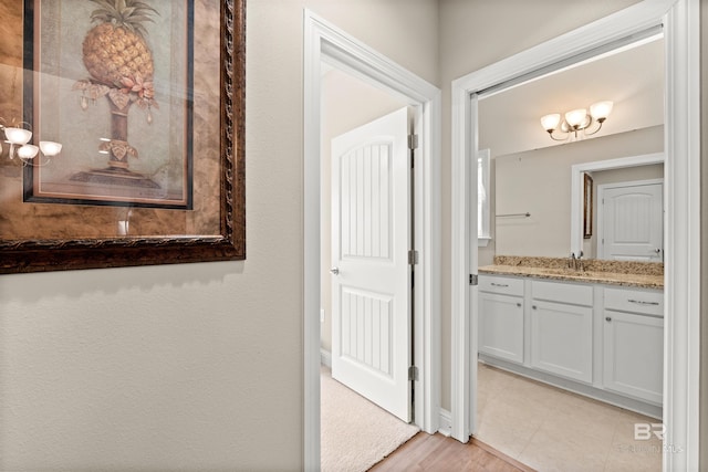 bathroom with tile patterned floors and vanity