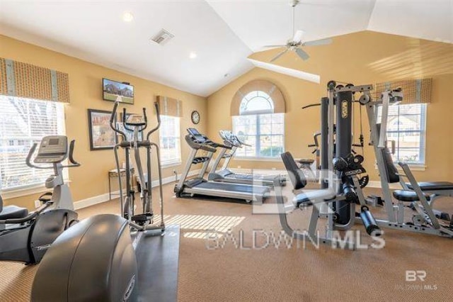 exercise room with visible vents, baseboards, lofted ceiling, and a ceiling fan