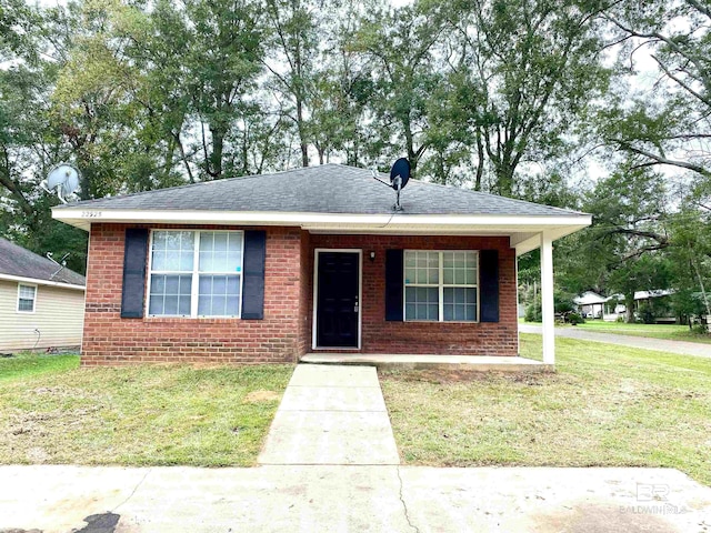 bungalow-style home with a porch and a front yard