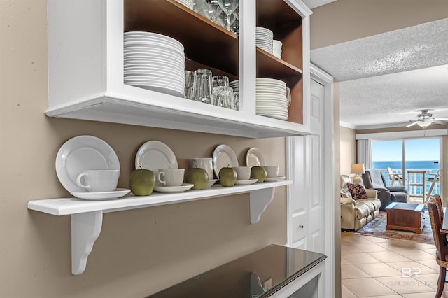 room details featuring a textured ceiling and a ceiling fan