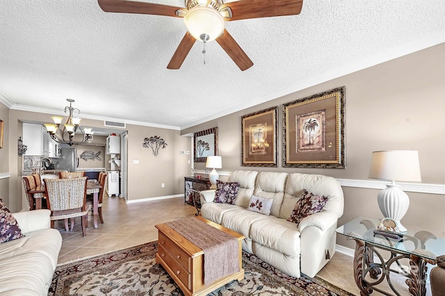 living area with light tile patterned flooring, crown molding, visible vents, and a textured ceiling