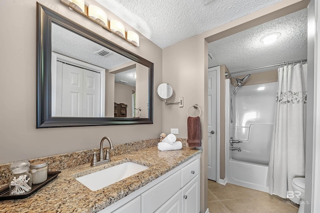 full bathroom with a closet, visible vents, shower / bathtub combination with curtain, a textured ceiling, and tile patterned flooring