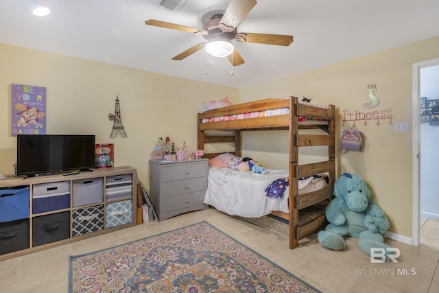 bedroom featuring light tile patterned floors and ceiling fan