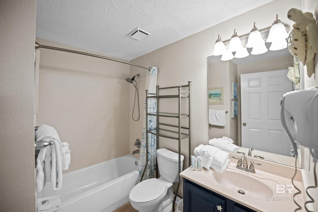 full bath with shower / bath combo with shower curtain, toilet, a textured ceiling, and vanity