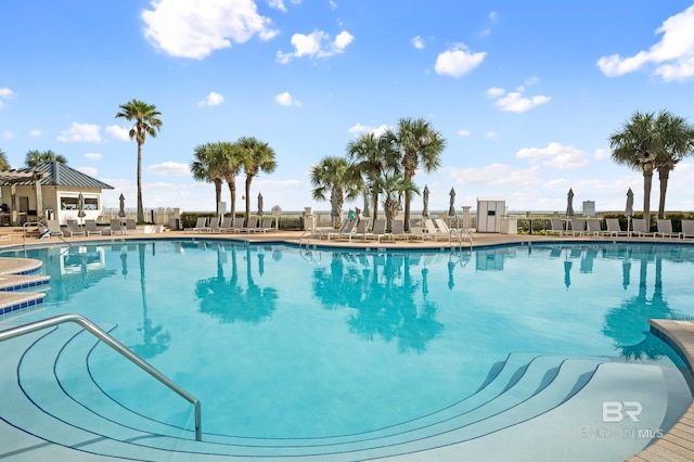 community pool featuring a patio area